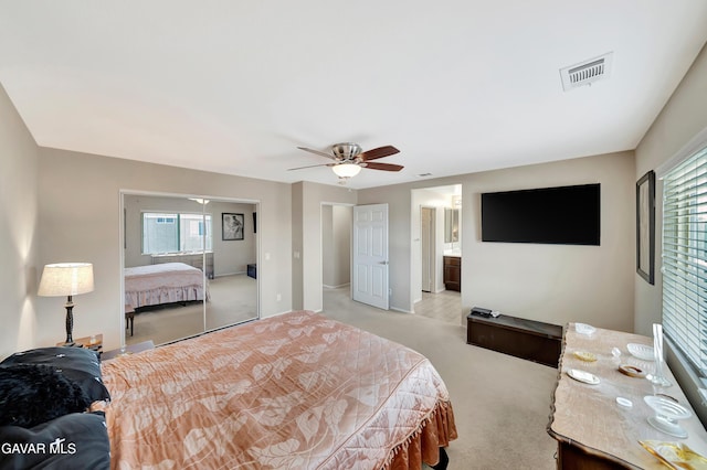 2354 Crimson Ave, Rosamond, CA 93560 - bedroom with light carpet, multiple windows, and a ceiling fan