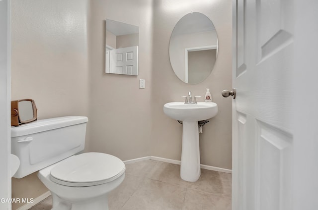2354 Crimson Ave, Rosamond, CA 93560 - half bathroom with toilet and tile patterned flooring