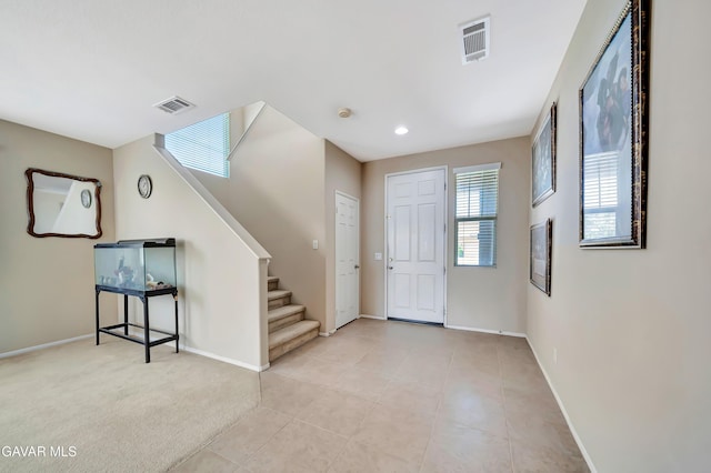 2354 Crimson Ave, Rosamond, CA 93560 - entrance foyer featuring stairs, light tile patterned floors, and recessed lighting