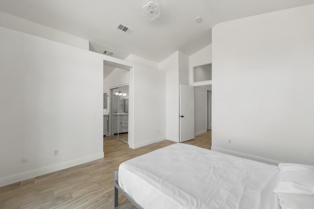 37116 Alder St, Palmdale, CA 93552 - bedroom with light wood finished floors, baseboards, and vaulted ceiling