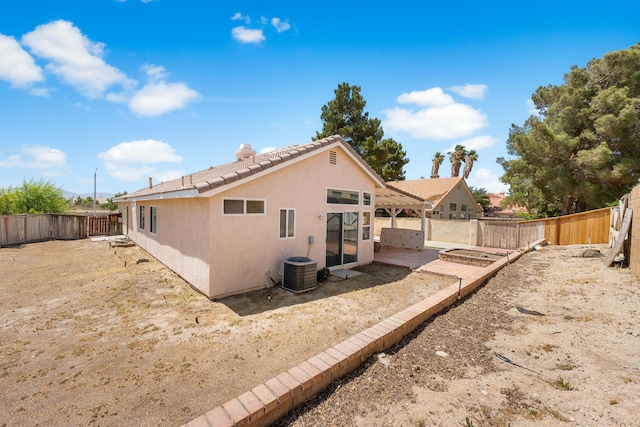 37116 Alder St, Palmdale, CA 93552 - rear view of property with stucco siding, a fenced backyard, central AC unit, a patio area, and a chimney