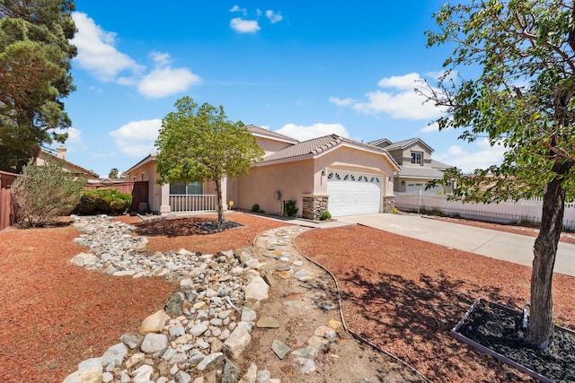 37116 Alder St, Palmdale, CA 93552 - view of front of home featuring a garage, stone siding, a tiled roof, concrete driveway, and stucco siding
