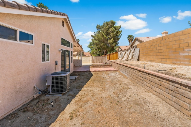 37116 Alder St, Palmdale, CA 93552 - fenced backyard featuring central air condition unit