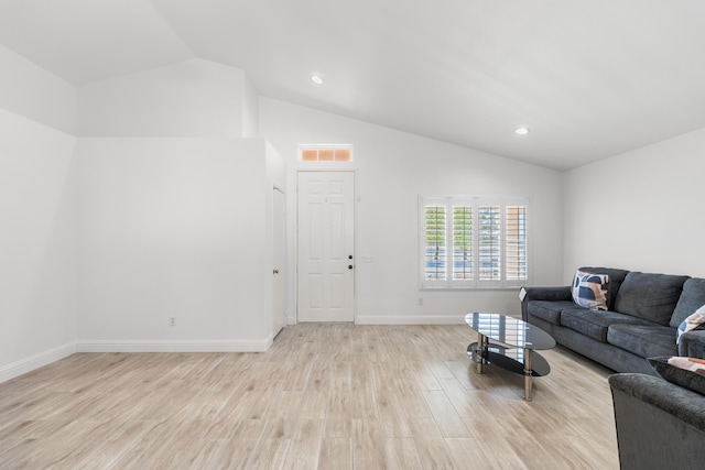 37116 Alder St, Palmdale, CA 93552 - living room with lofted ceiling, light wood-style floors, baseboards, and recessed lighting