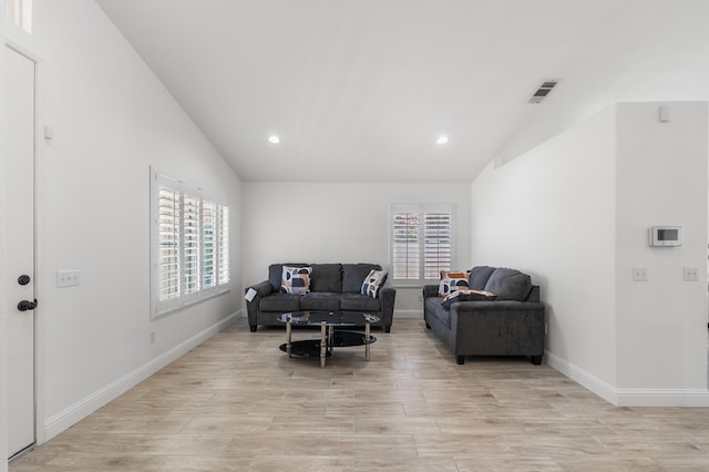 37116 Alder St, Palmdale, CA 93552 - living room featuring lofted ceiling, light wood finished floors, recessed lighting, and baseboards