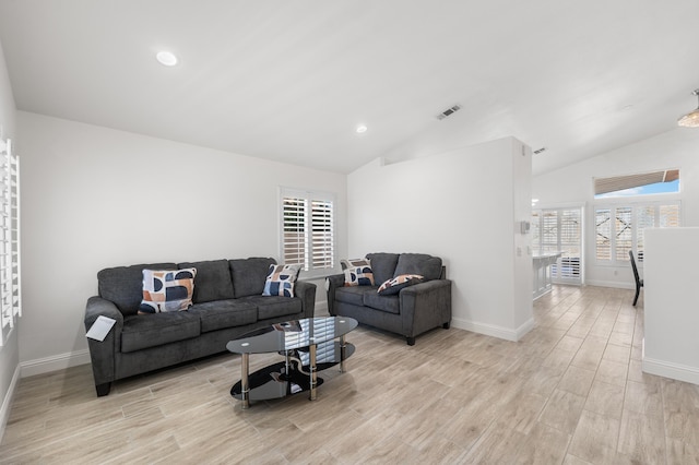 37116 Alder St, Palmdale, CA 93552 - living area with light wood finished floors, baseboards, lofted ceiling, and recessed lighting