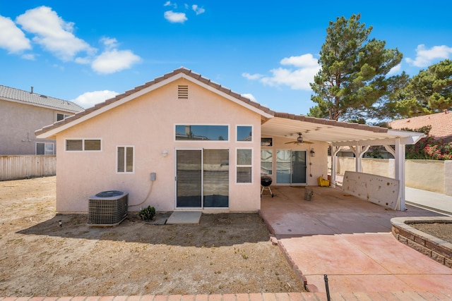 37116 Alder St, Palmdale, CA 93552 - back of property featuring ceiling fan, stucco siding, a patio area, a fenced backyard, and central AC unit