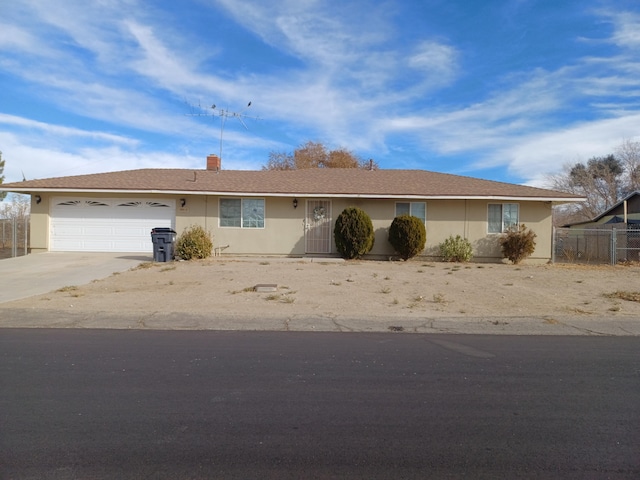 single story home with a garage