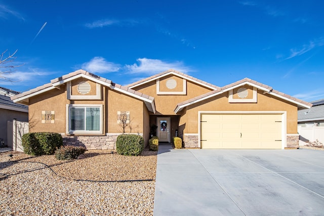 view of front of property featuring a garage