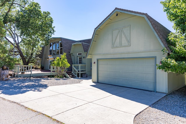 front of property featuring a deck