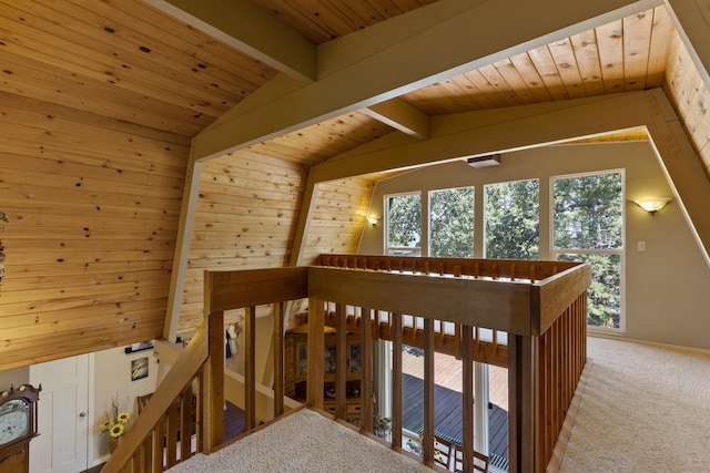 hall featuring wood ceiling, carpet floors, and vaulted ceiling with beams