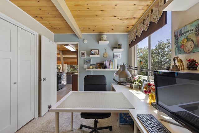 office space with wood ceiling, light carpet, and beamed ceiling