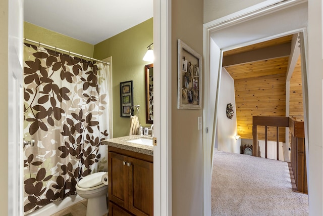 bathroom featuring vanity, curtained shower, toilet, and wood walls