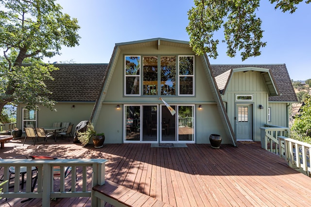 rear view of property with a deck