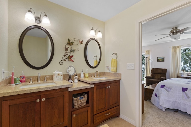 bathroom featuring ceiling fan and vanity