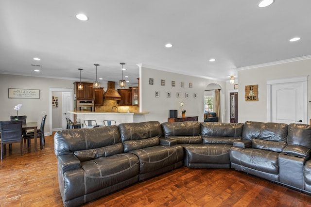 23600 Dart Dr, Tehachapi, CA 93561 - living area with arched walkways, recessed lighting, wood finished floors, and crown molding