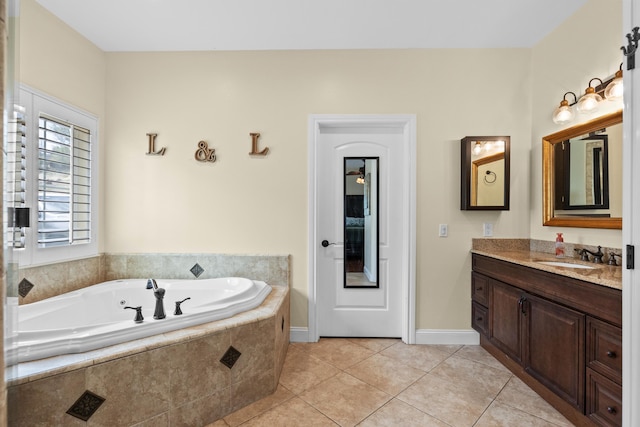 23600 Dart Dr, Tehachapi, CA 93561 - bathroom with tile patterned floors, a bath, vanity, and baseboards
