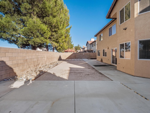 exterior space featuring a patio and a fenced backyard