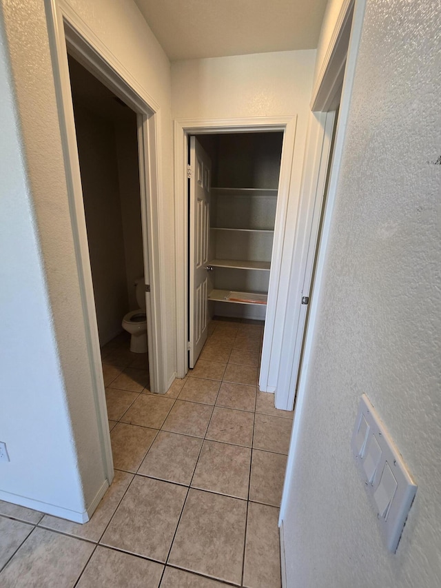 37515 Ruby Red Ln, Palmdale, CA 93551 - hallway with light tile patterned floors