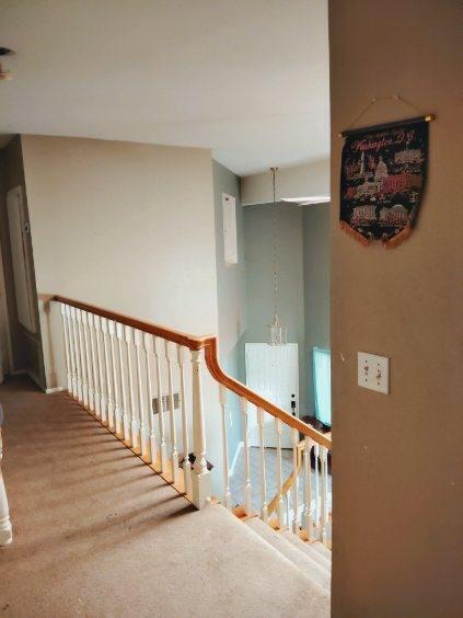 corridor featuring carpet floors