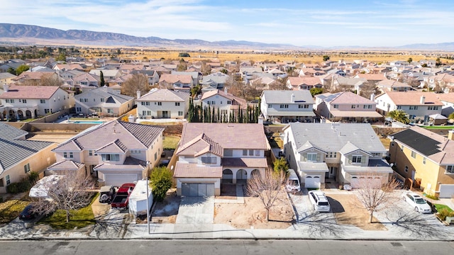 bird's eye view with a mountain view and a residential view