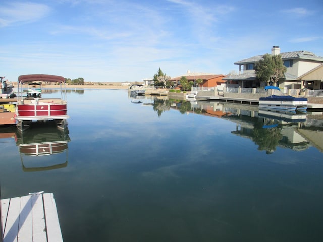 dock area with a water view