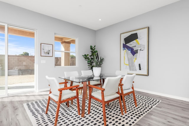 dining room with light hardwood / wood-style floors