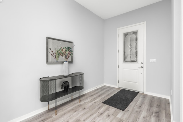 foyer with light hardwood / wood-style flooring