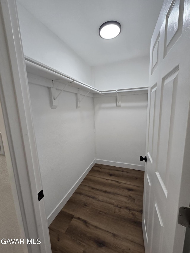 4102 Pearblossom Hwy, Palmdale, CA 93552 - spacious closet featuring dark wood-style flooring