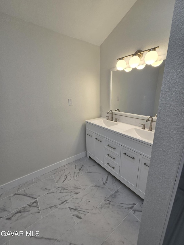 4102 Pearblossom Hwy, Palmdale, CA 93552 - full bath featuring vaulted ceiling, marble finish flooring, and double vanity