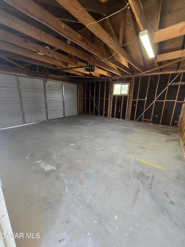 4102 Pearblossom Hwy, Palmdale, CA 93552 - garage featuring a garage door opener