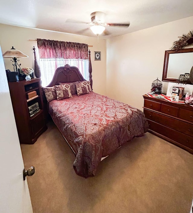 bedroom with carpet flooring and ceiling fan