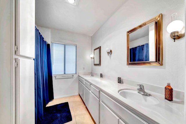 bathroom featuring tile patterned floors and vanity