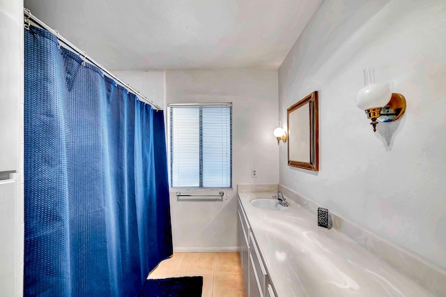 bathroom with vanity and tile patterned floors