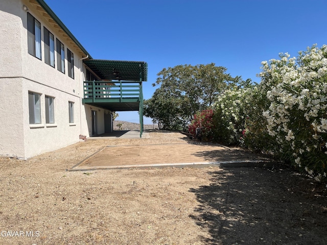 28714 Cruthers Creek Rd, Pearblossom, CA 93553 - view of yard with a patio area and a balcony