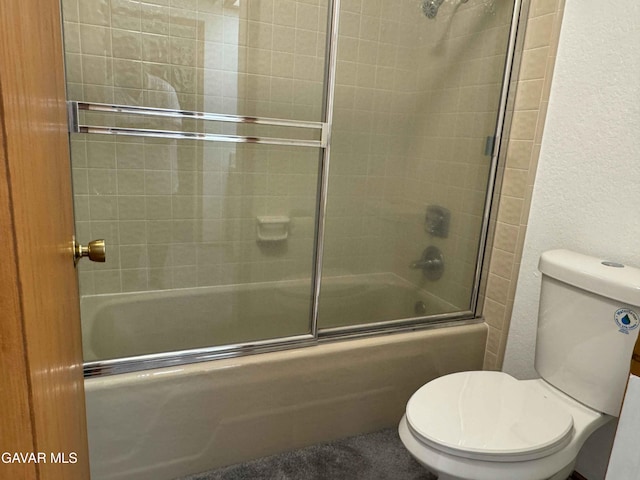 28714 Cruthers Creek Rd, Pearblossom, CA 93553 - bathroom featuring bath / shower combo with glass door and a textured wall