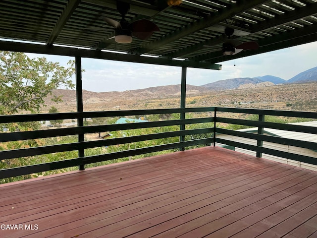 28714 Cruthers Creek Rd, Pearblossom, CA 93553 - deck featuring a ceiling fan, a pergola, and a mountain view