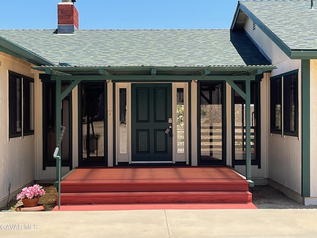 28714 Cruthers Creek Rd, Pearblossom, CA 93553 - property entrance featuring roof with shingles, a chimney, and covered porch