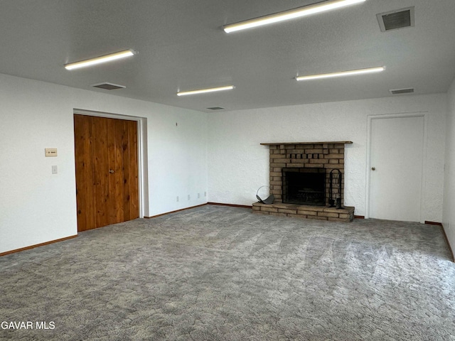 28714 Cruthers Creek Rd, Pearblossom, CA 93553 - unfurnished living room featuring carpet floors and a fireplace