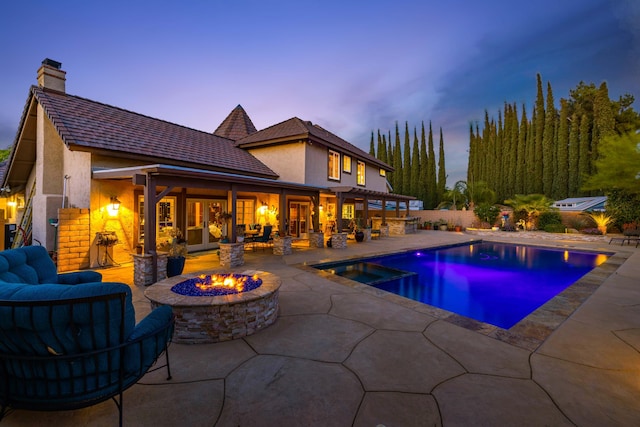 436 Fairway Dr, Palmdale, CA 93551 - view of swimming pool with a patio, an outdoor living space with a fire pit, and a pool with connected hot tub