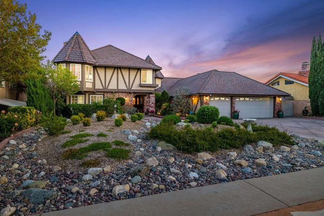 436 Fairway Dr, Palmdale, CA 93551 - view of front of property featuring a garage, stucco siding, and concrete driveway