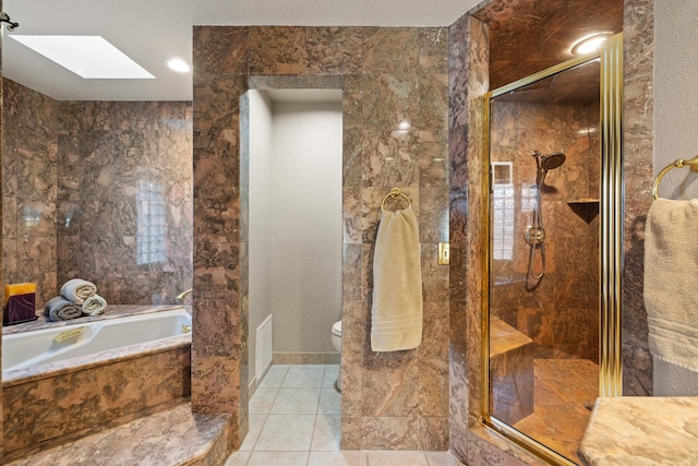 436 Fairway Dr, Palmdale, CA 93551 - bathroom featuring a stall shower, a skylight, toilet, and a bath