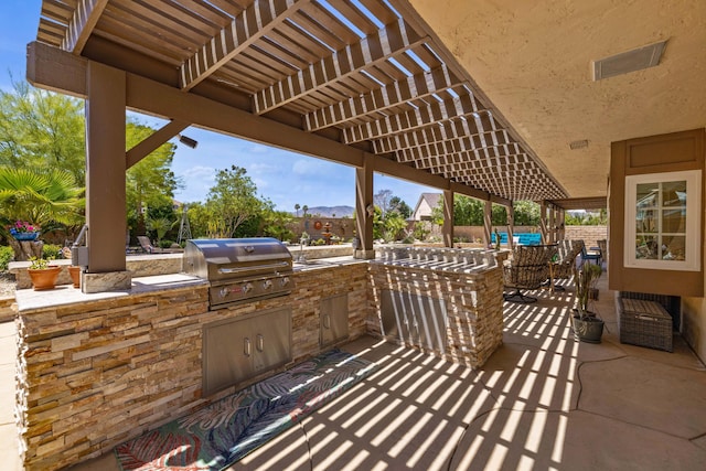 436 Fairway Dr, Palmdale, CA 93551 - view of patio / terrace featuring grilling area, exterior kitchen, a pergola, a mountain view, and a sink