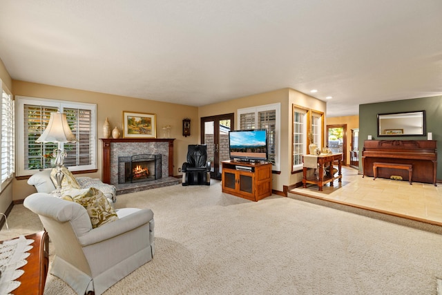 436 Fairway Dr, Palmdale, CA 93551 - living area featuring a lit fireplace, carpet, baseboards, and recessed lighting