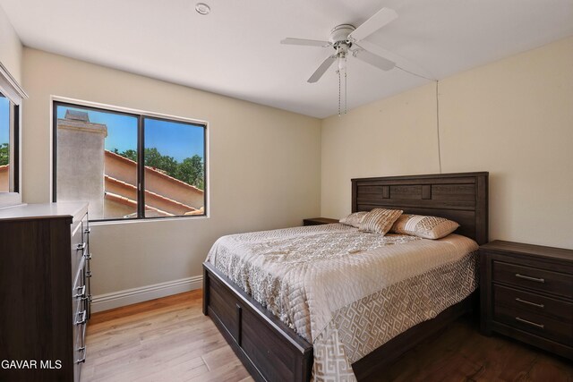 38100 San Mateo Ave, Palmdale, CA 93551 - bedroom featuring light wood finished floors and ceiling fan