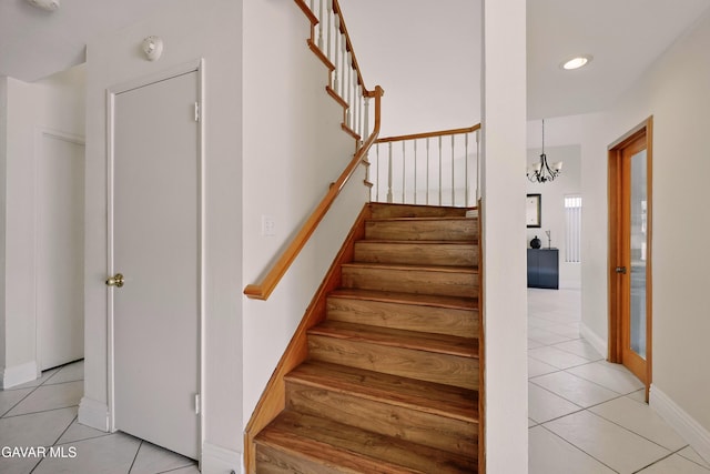 38100 San Mateo Ave, Palmdale, CA 93551 - staircase featuring tile patterned floors, a chandelier, and recessed lighting
