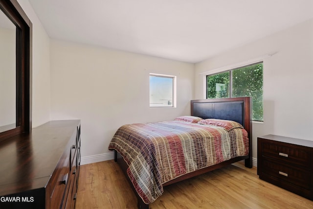 38100 San Mateo Ave, Palmdale, CA 93551 - bedroom with light wood-style flooring and baseboards