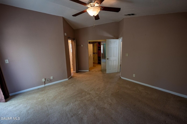4722 Sungate Dr, Palmdale, CA 93551 - unfurnished bedroom with light carpet, vaulted ceiling, and a ceiling fan