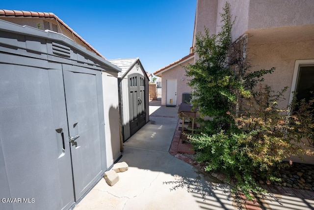 4722 Sungate Dr, Palmdale, CA 93551 - view of property exterior featuring a storage unit and stucco siding
