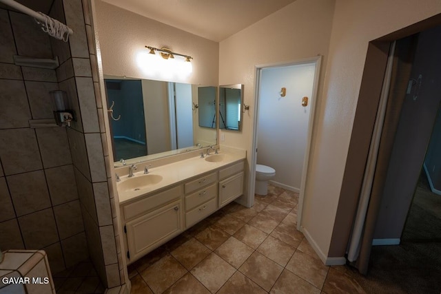 4722 Sungate Dr, Palmdale, CA 93551 - full bathroom with double vanity and tile patterned floors